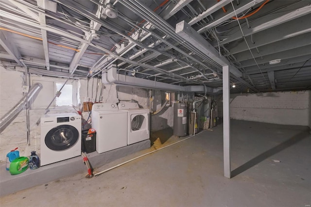 5044 Lindenwood Ave, Saint Louis, MO 63109 - below grade area featuring washing machine and dryer, water heater, and heating unit