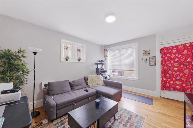 5044 Lindenwood Ave, Saint Louis, MO 63109 - living area with wood finished floors and baseboards