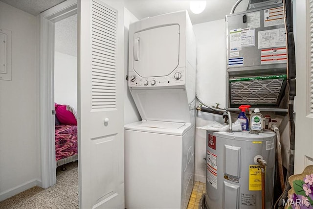 laundry room featuring stacked washer / dryer, water heater, heating unit, and baseboards