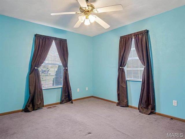 100 Fairway Dr, Waterloo, IL 62298 - unfurnished room featuring carpet flooring, ceiling fan, and baseboards