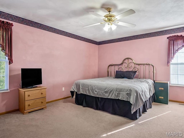100 Fairway Dr, Waterloo, IL 62298 - bedroom with carpet flooring, baseboards, and ceiling fan