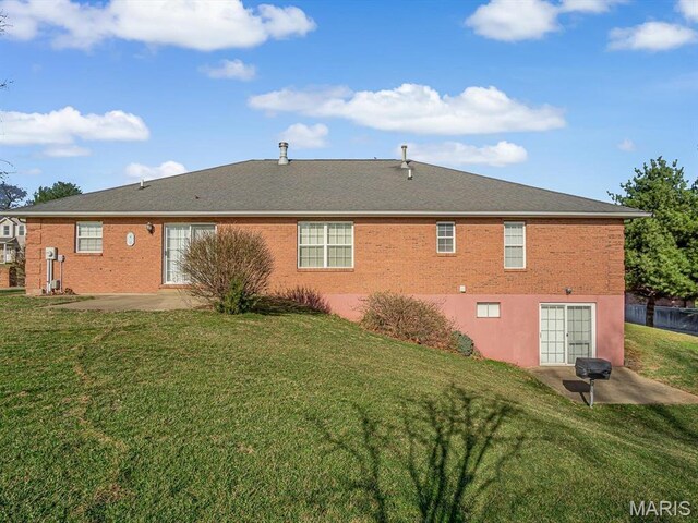 100 Fairway Dr, Waterloo, IL 62298 - rear view of house with a yard, a patio area, and brick siding