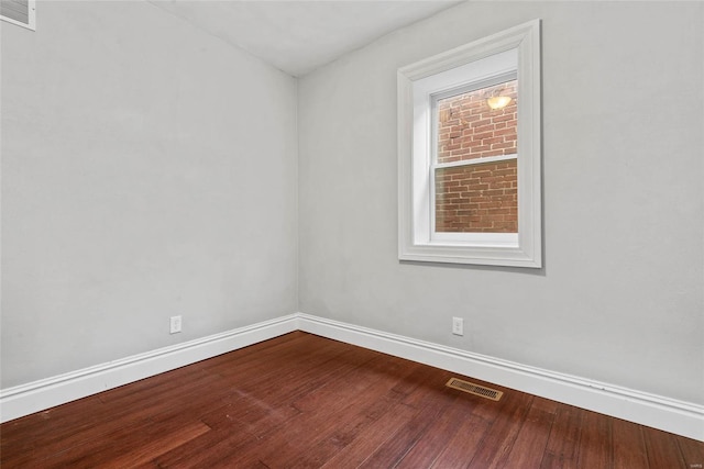 2714 Texas Ave, Saint Louis, MO 63118 - spare room with baseboards and dark wood finished floors