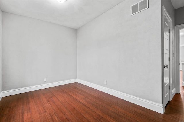 2714 Texas Ave, Saint Louis, MO 63118 - empty room with dark wood-style floors and baseboards