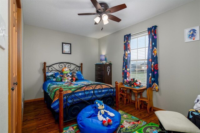15919 Candy Corner Ln, Carlyle, IL 62231 - bedroom with wood finished floors, baseboards, and ceiling fan