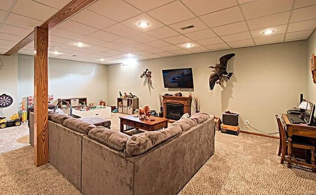 15919 Candy Corner Ln, Carlyle, IL 62231 - living area with light colored carpet, a drop ceiling, a fireplace, and recessed lighting