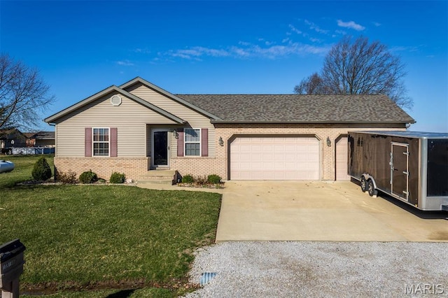 15919 Candy Corner Ln, Carlyle, IL 62231 - ranch-style home featuring brick siding, concrete driveway, a garage, and a front lawn