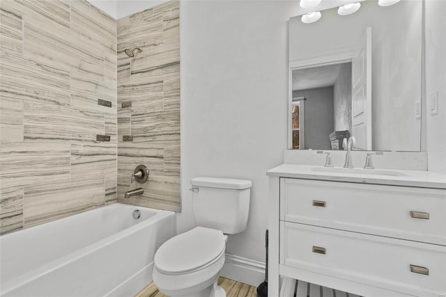 2716 Texas Ave, Saint Louis, MO 63118 - bathroom with toilet, tub / shower combination, vanity, and baseboards