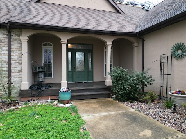 4072 Osage Rdg, House Springs, MO 63051 - entrance to property featuring a shingled roof, covered porch, and stucco siding