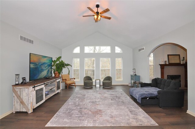 4072 Osage Rdg, House Springs, MO 63051 - living room with healthy amount of natural light, a ceiling fan, a fireplace, dark wood-style floors, and high vaulted ceiling