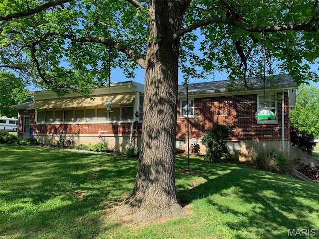 113 S Madison St, Desloge, MO 63601 - view of front of house with brick siding and a front yard