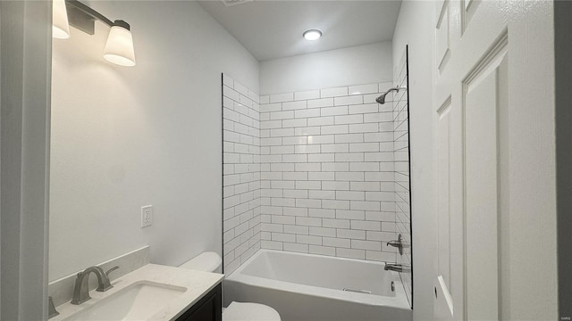 full bathroom with toilet, vanity, and shower / bathtub combination