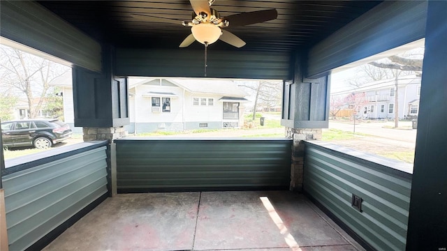 balcony featuring ceiling fan