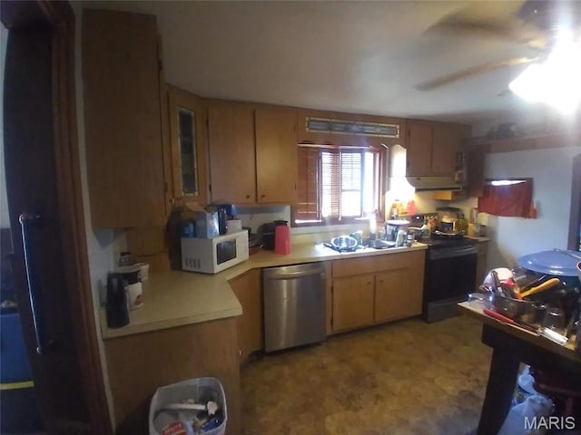 4158 Walker Hl, De Soto, MO 63020 - kitchen with dishwasher, black / electric stove, white microwave, light countertops, and a sink