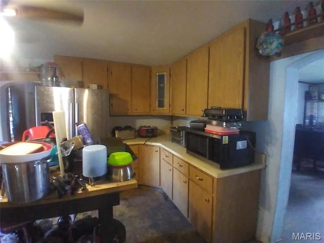 4158 Walker Hl, De Soto, MO 63020 - kitchen featuring light countertops, black microwave, and stainless steel refrigerator with ice dispenser