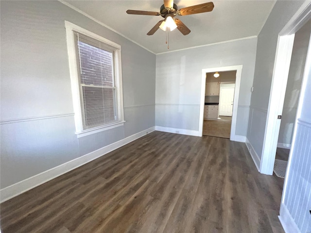 4720 Goethe Ave, Saint Louis, MO 63116 - unfurnished room featuring ornamental molding, dark wood finished floors, a ceiling fan, and baseboards