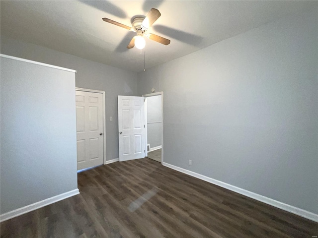 4720 Goethe Ave, Saint Louis, MO 63116 - empty room featuring dark wood-style floors, a ceiling fan, and baseboards