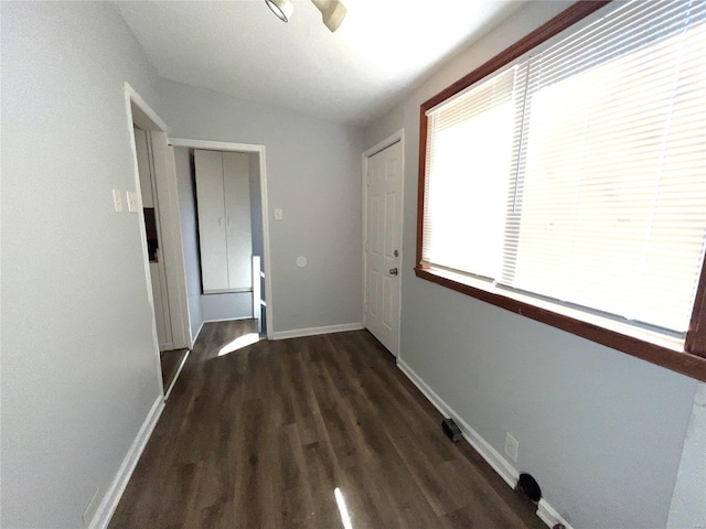 4720 Goethe Ave, Saint Louis, MO 63116 - hallway with dark wood-style floors and baseboards