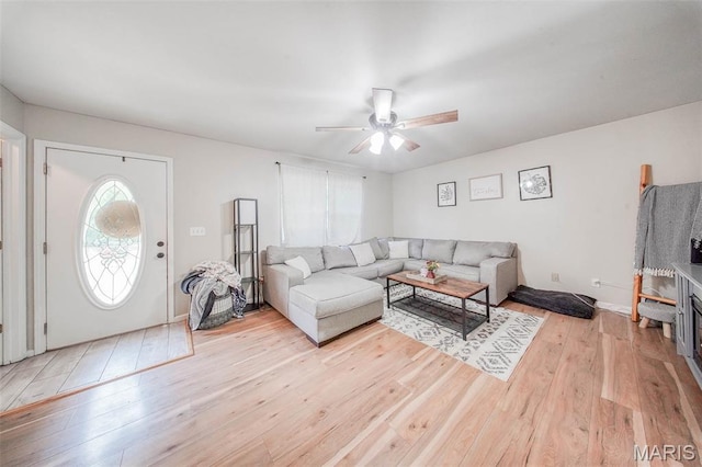 24478 Trolley Ln, Saint Robert, MO 65584 - living room with a ceiling fan and light wood-style flooring