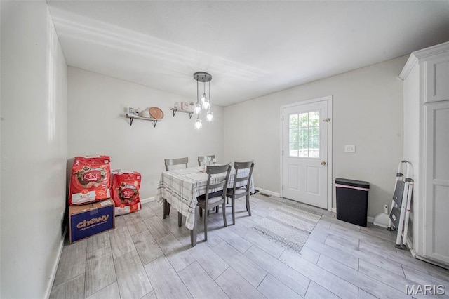 24478 Trolley Ln, Saint Robert, MO 65584 - dining room featuring wood finish floors and baseboards
