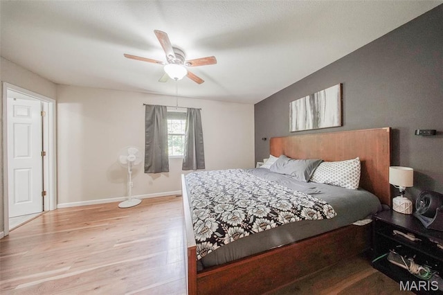 24478 Trolley Ln, Saint Robert, MO 65584 - bedroom featuring wood finished floors, baseboards, and ceiling fan