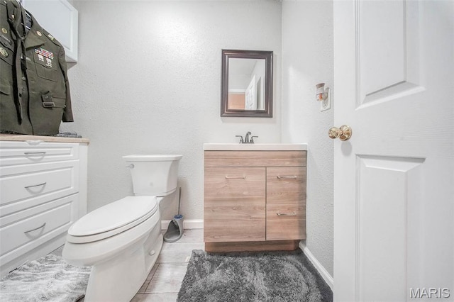 24478 Trolley Ln, Saint Robert, MO 65584 - half bath featuring toilet, vanity, and baseboards