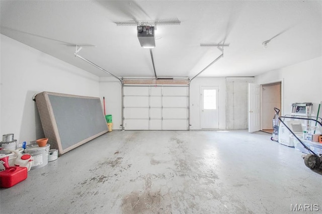 24478 Trolley Ln, Saint Robert, MO 65584 - garage featuring a garage door opener