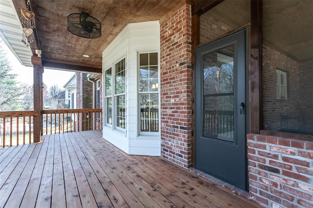 wooden terrace with covered porch