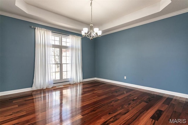 10 Dunbridge Ct, Glen Carbon, IL 62034 - unfurnished room featuring a raised ceiling, a chandelier, dark wood-type flooring, and ornamental molding