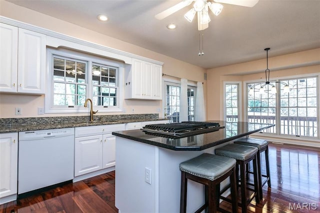 10 Dunbridge Ct, Glen Carbon, IL 62034 - kitchen featuring white dishwasher, dark wood-style floors, plenty of natural light, and recessed lighting
