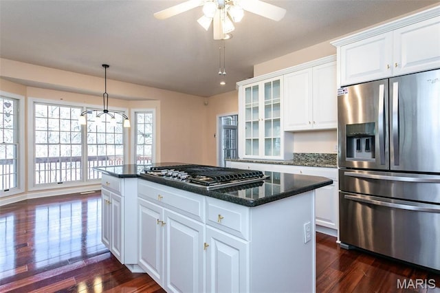 10 Dunbridge Ct, Glen Carbon, IL 62034 - kitchen with stainless steel appliances, dark wood-style flooring, glass insert cabinets, and white cabinets