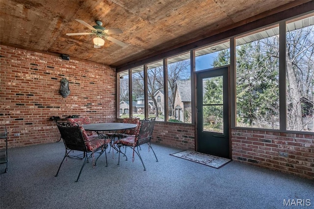 10 Dunbridge Ct, Glen Carbon, IL 62034 - sunroom with brick wall, ceiling fan, carpet, outdoor dining area, and wood ceiling