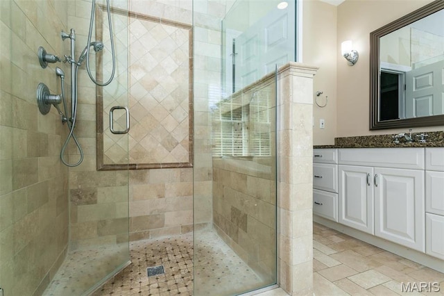 10 Dunbridge Ct, Glen Carbon, IL 62034 - full bathroom with tiled shower, vanity, and a wainscoted wall