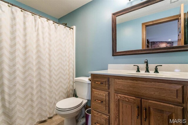 10 Dunbridge Ct, Glen Carbon, IL 62034 - full bathroom with vanity, a textured ceiling, and a shower with shower curtain