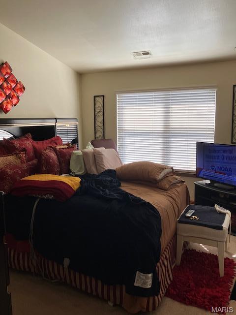 4304 Inlet Isle Dr, Florissant, MO 63034 - bedroom featuring carpet