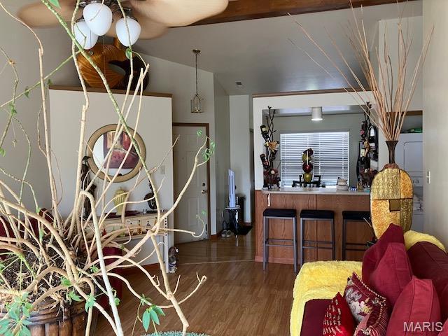 4304 Inlet Isle Dr, Florissant, MO 63034 - living area featuring wood finished floors and vaulted ceiling