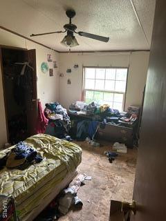 19050 Sikes Rd, Saint Genevieve, MO 63670 - carpeted bedroom featuring a textured ceiling and a ceiling fan