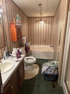 19050 Sikes Rd, Saint Genevieve, MO 63670 - full bathroom with a tub to relax in, vanity, toilet, wallpapered walls, and a shower