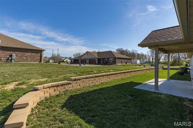 533 Windsor Ln, Farmington, MO 63640 - view of grassy yard featuring a patio area