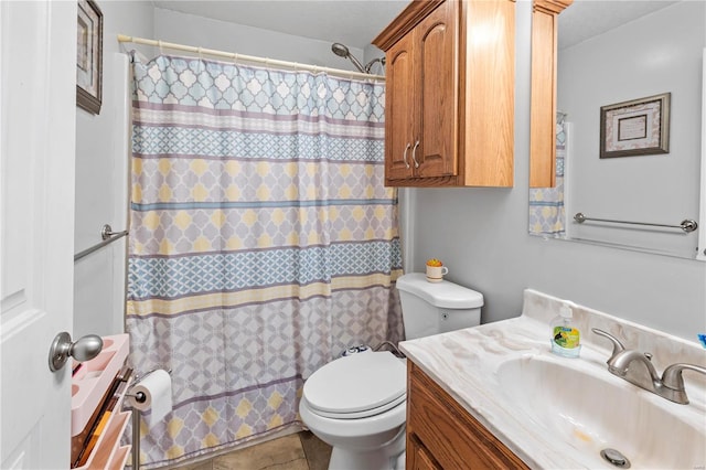 full bathroom featuring toilet, a shower with curtain, vanity, and tile patterned flooring