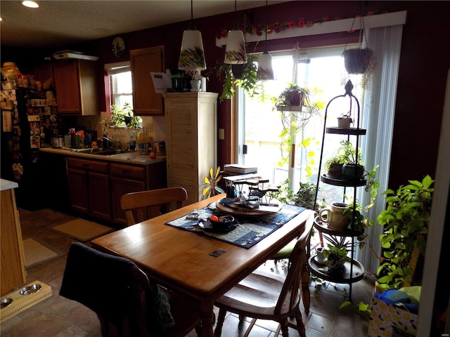 dining space with plenty of natural light and recessed lighting