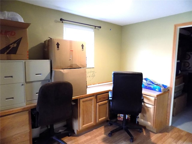 office area with light wood-style floors