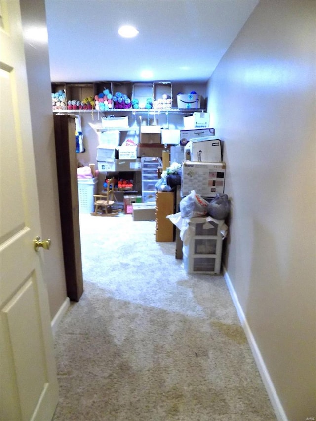corridor with carpet, baseboards, and recessed lighting