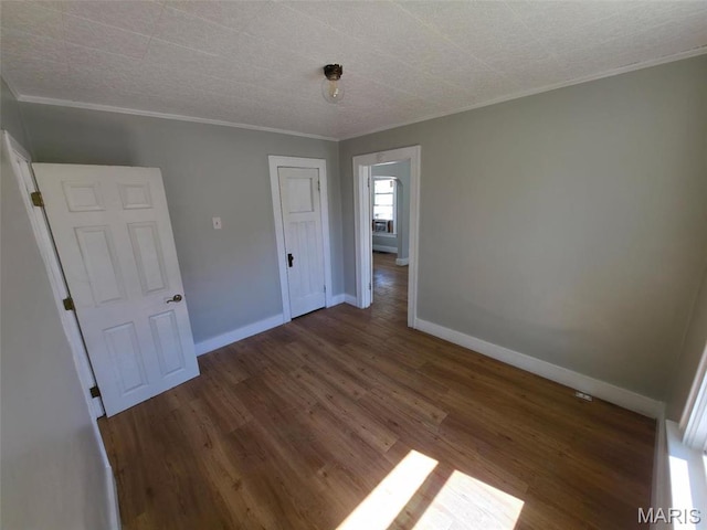 427 S Louisiana St, Cape Girardeau, MO 63703 - unfurnished room with crown molding, baseboards, and wood finished floors