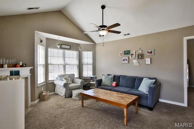480 Benton Dr Unit J, Saint Peters, MO 63376 - carpeted living area with vaulted ceiling, ceiling fan, and baseboards