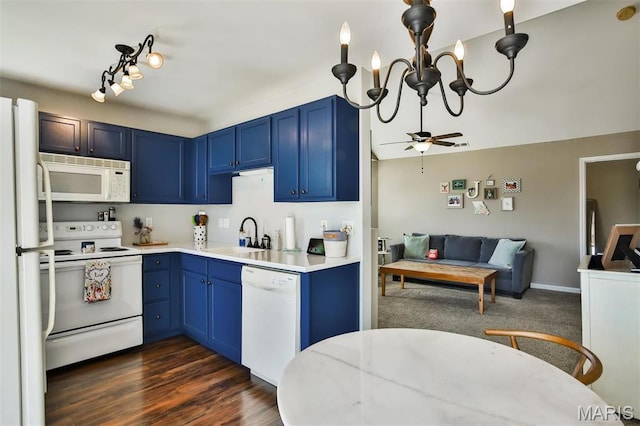 480 Benton Dr Unit J, Saint Peters, MO 63376 - kitchen featuring white appliances, a sink, blue cabinetry, light countertops, and a chandelier