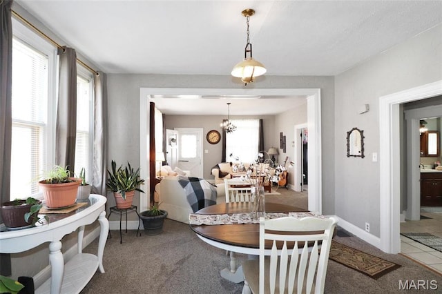 515 N Washington St, Mexico, MO 65265 - dining area with carpet, healthy amount of natural light, and baseboards