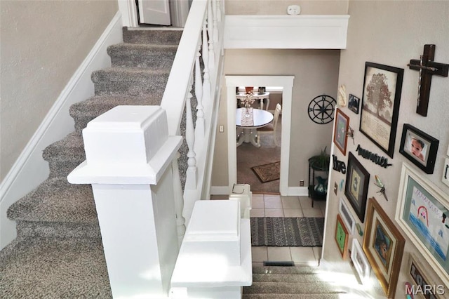 515 N Washington St, Mexico, MO 65265 - stairs featuring tile patterned flooring