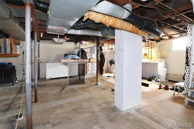 515 N Washington St, Mexico, MO 65265 - basement featuring washer and dryer