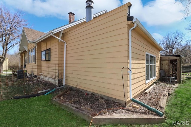 515 N Washington St, Mexico, MO 65265 - view of property exterior featuring a chimney